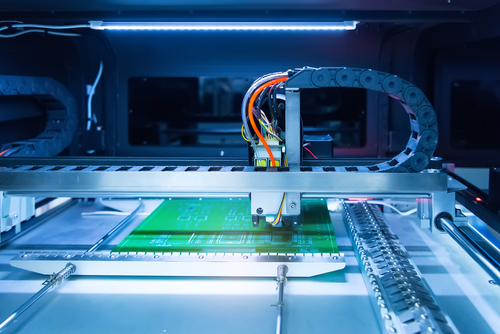 Automated linear system for soldering iron tips and assembling PCB boards.
