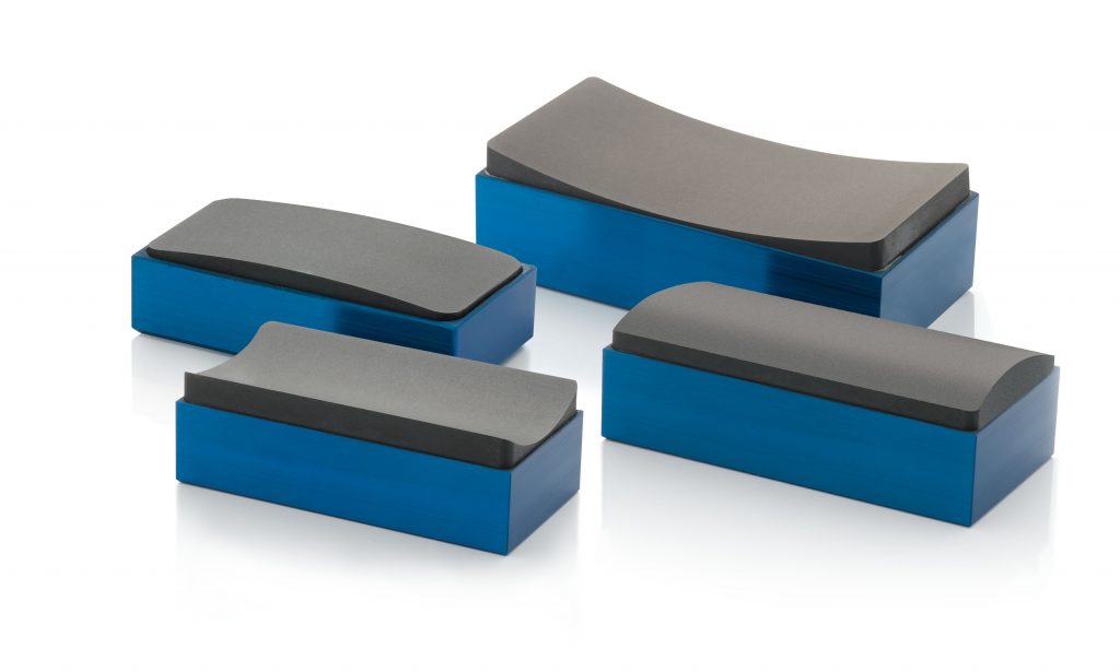 Collection of four New Way radial air bearings shown in both concave and convex profiles.
