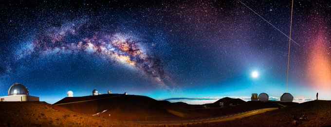 Composite image of the night sky behind the W M Keck Observatory