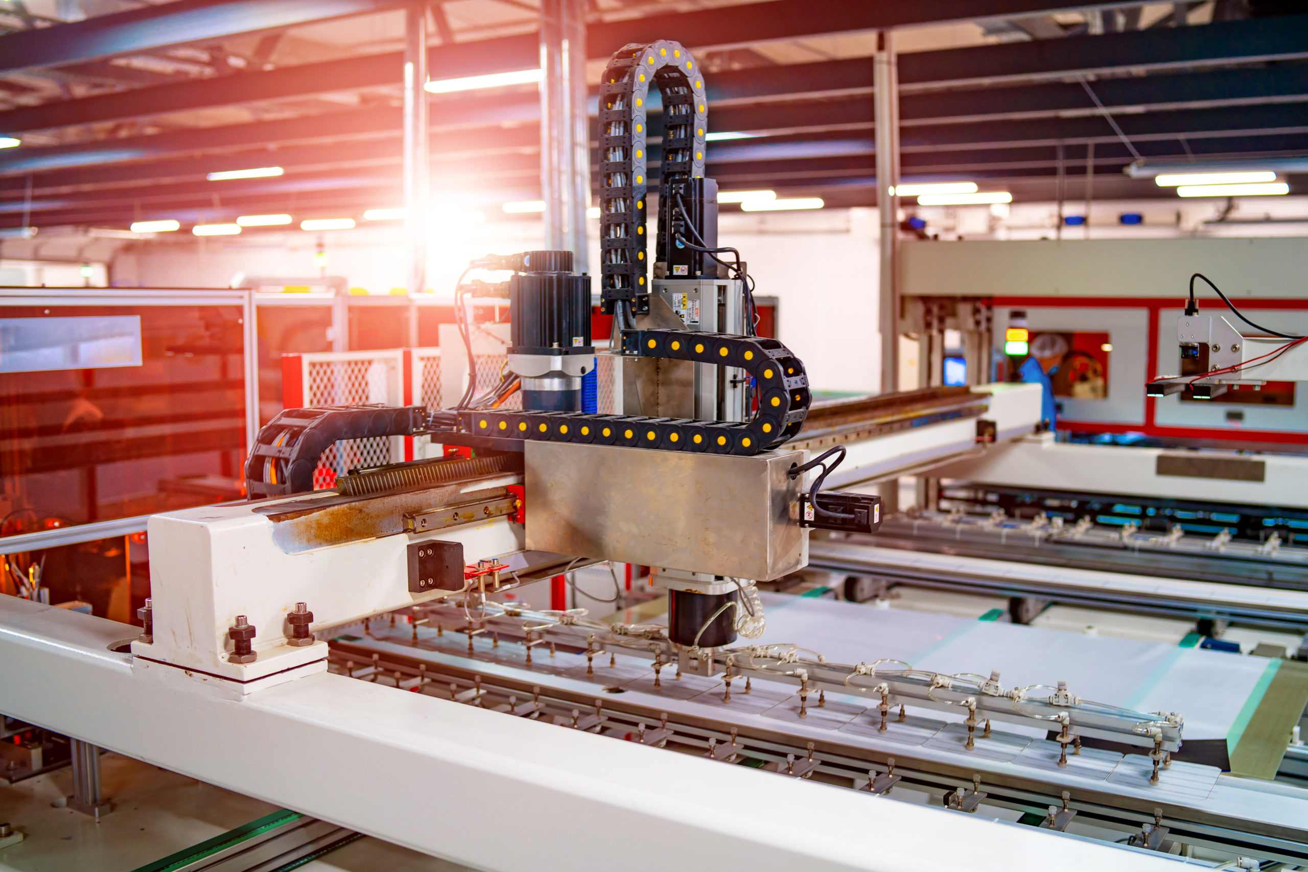 Special automated equipment producing solar panels on a conveyor in a modern production plant