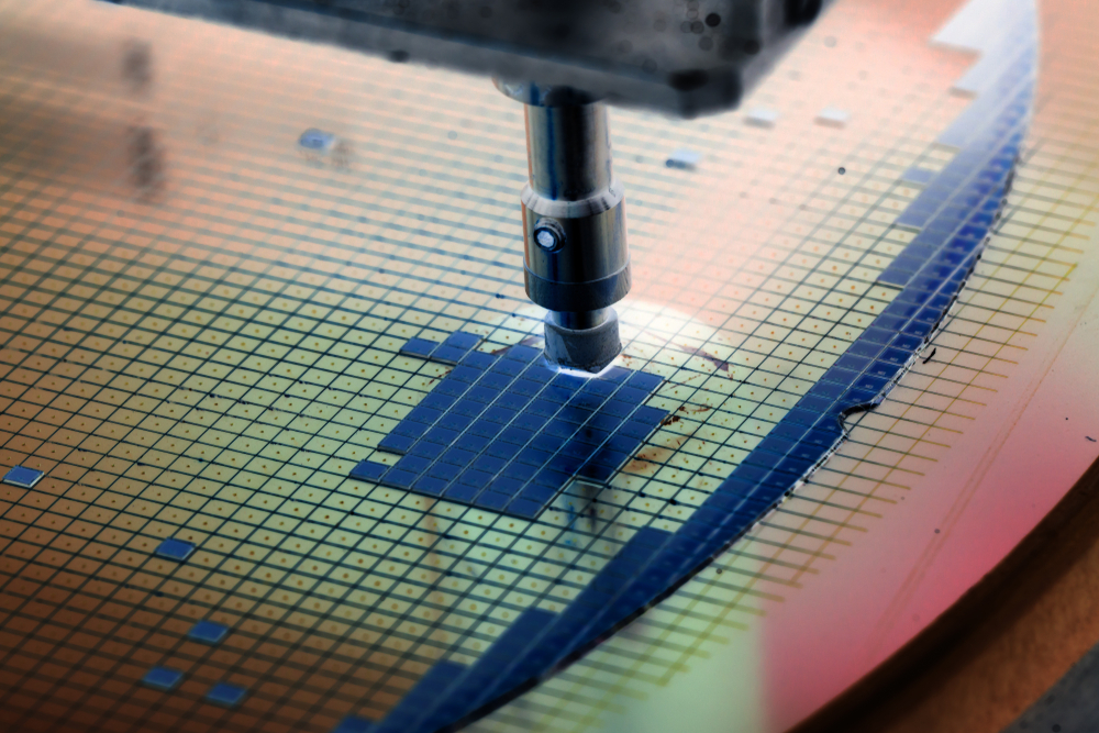 Silicon wafer in die attach machine during semiconductor manufacturing process