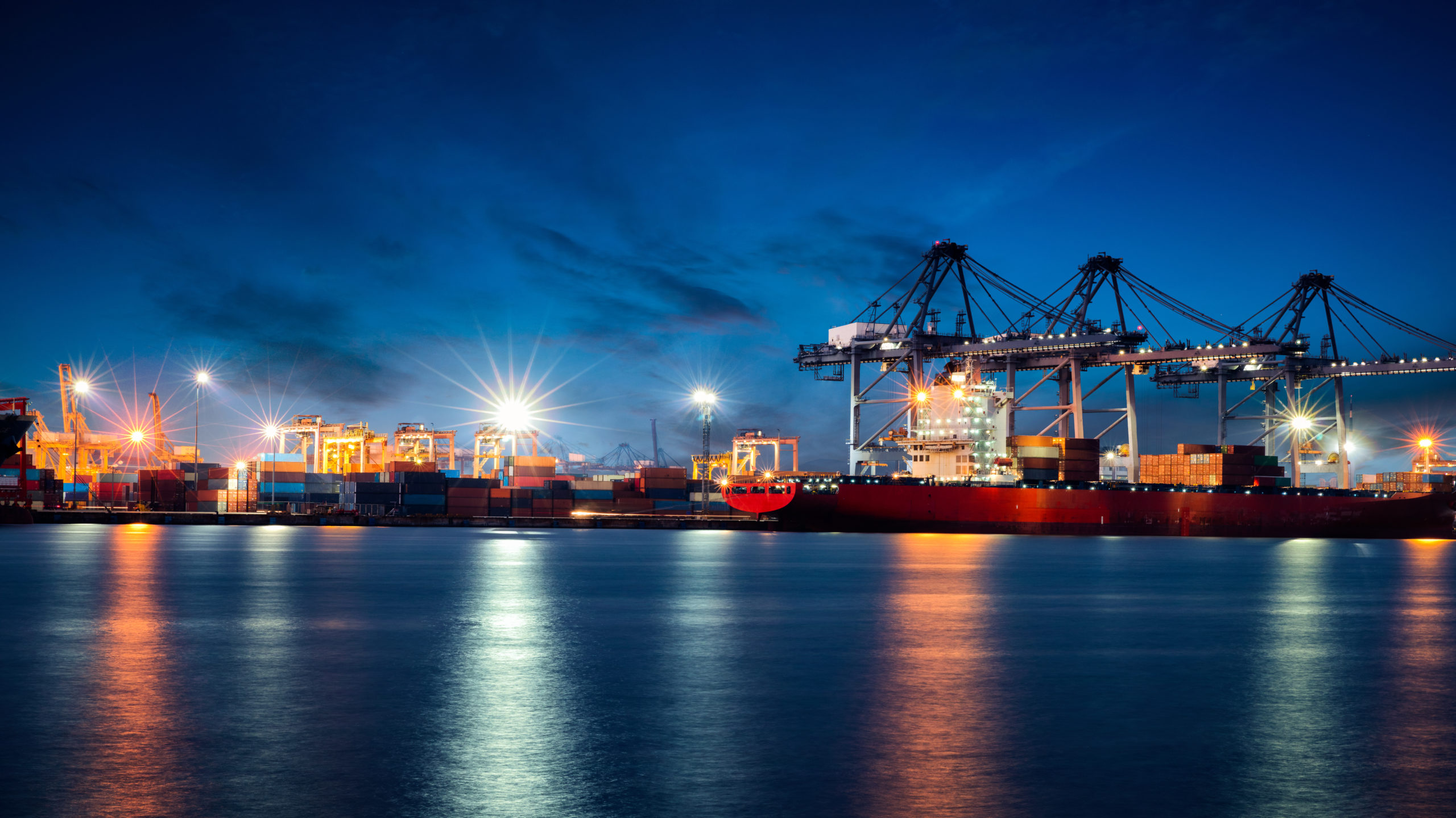 View of a shipping port at dusk